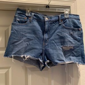 LEVI’S Women’s high rise shorts size 34 with 36” waist.